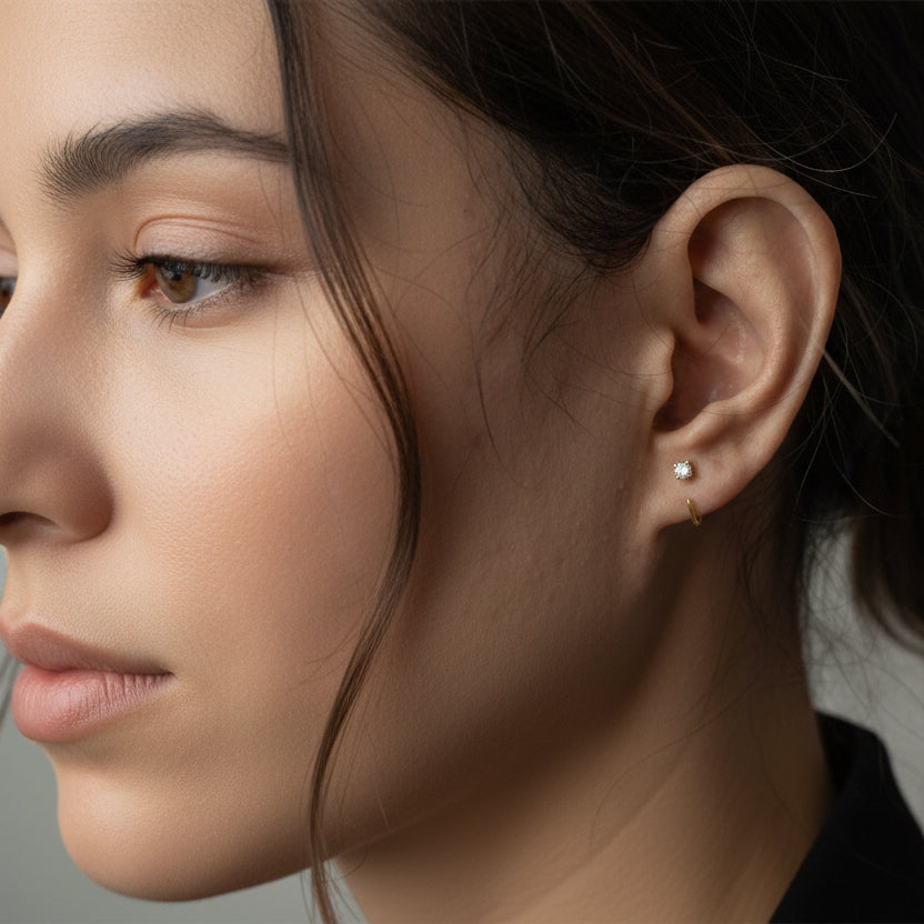 solid gold curve stud earring on model