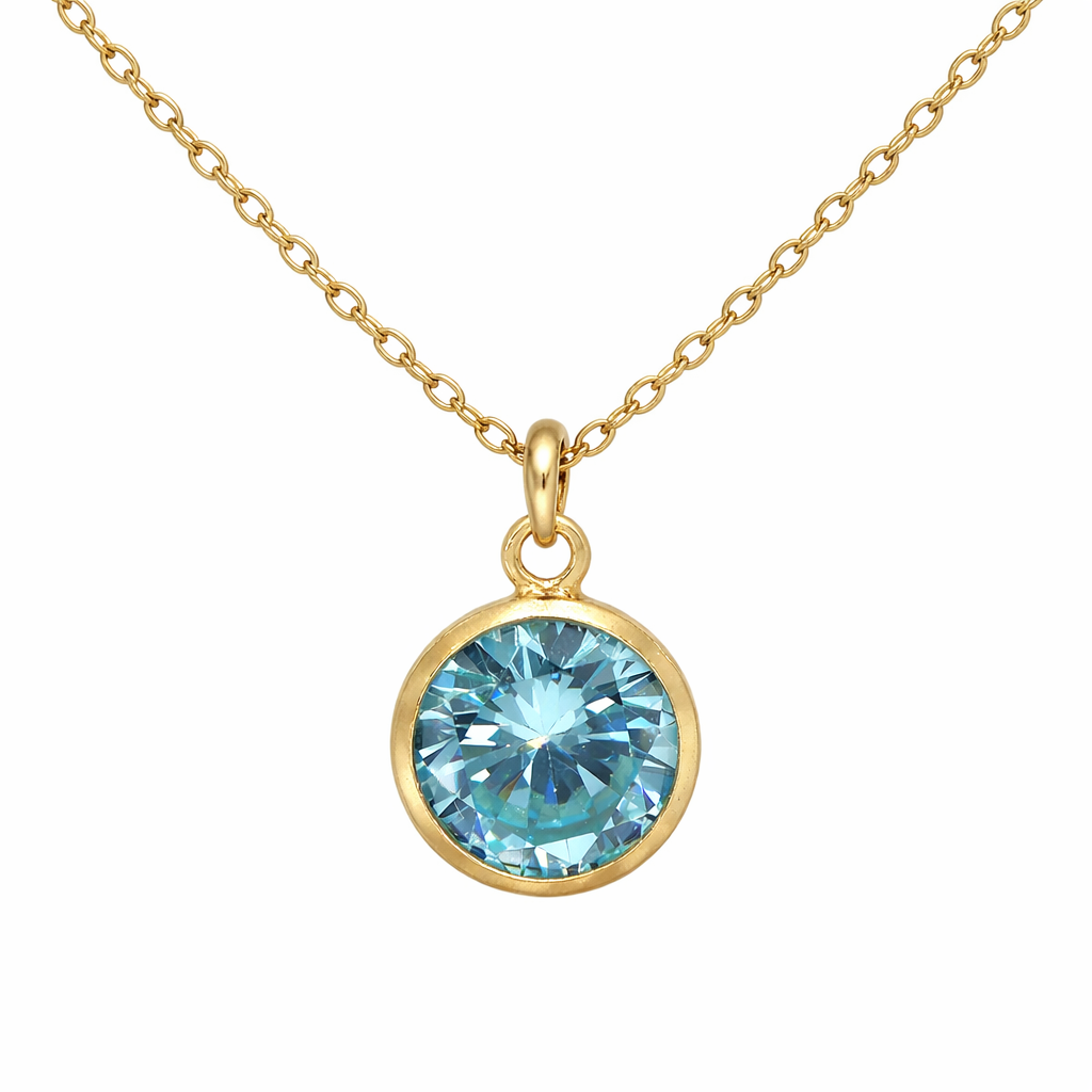 December birthstone necklace with a blue gemstone pendant on a white background