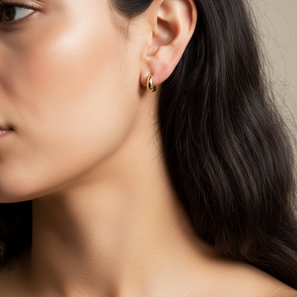 gold vermeil Dome Huggies on model