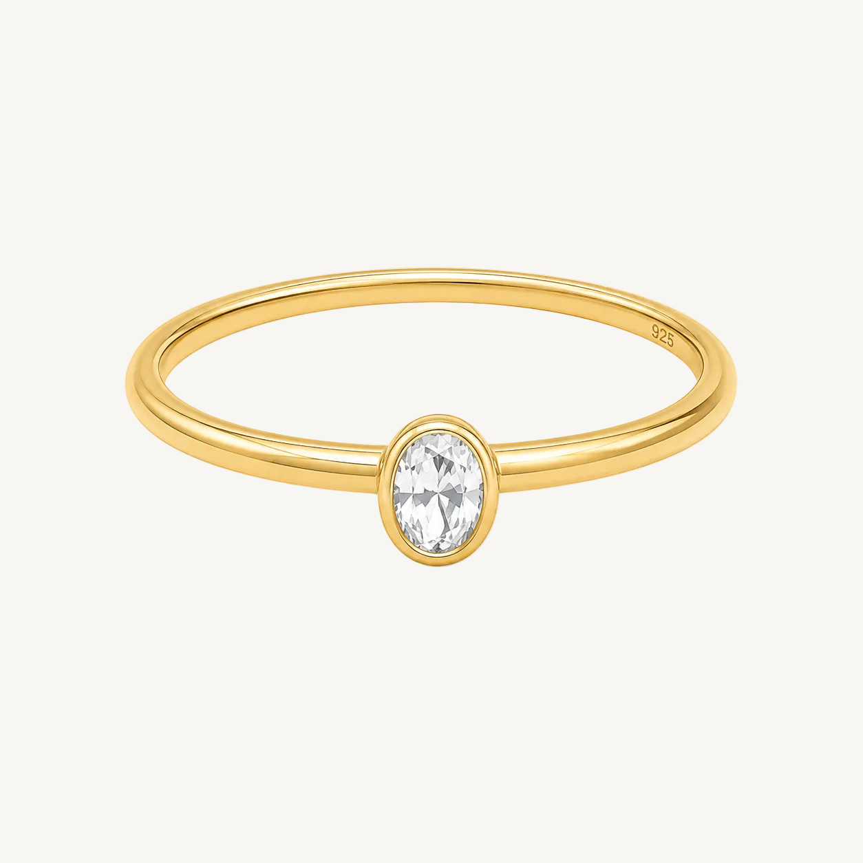 elle oval lab diamond bezel solitaire ring in gold vermeil.