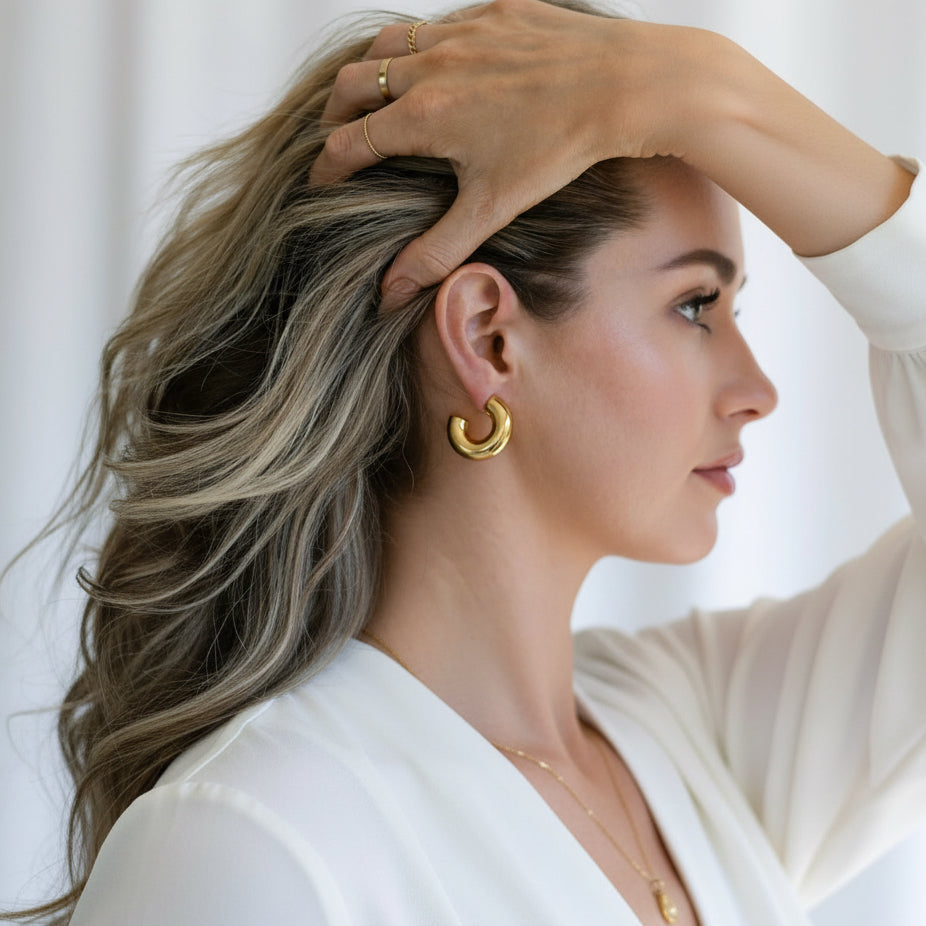 Statement C-shaped hoop earrings in gold plated design