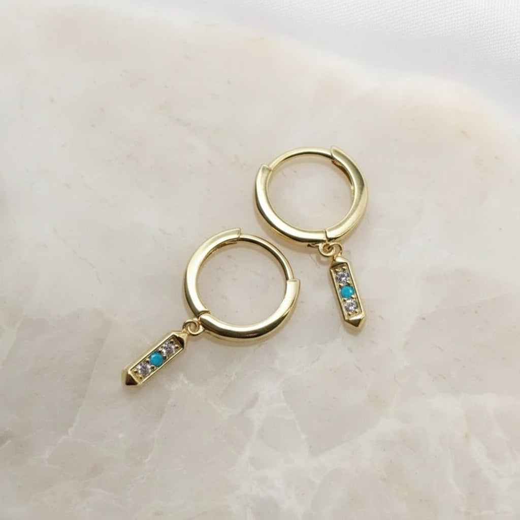 Minimal Zara drop huggie earrings – closeup