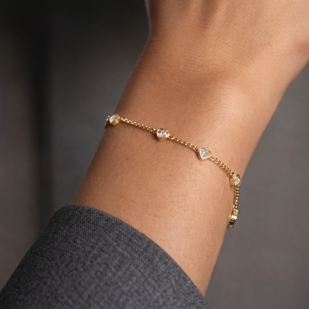 heart charm bracelet on wrist