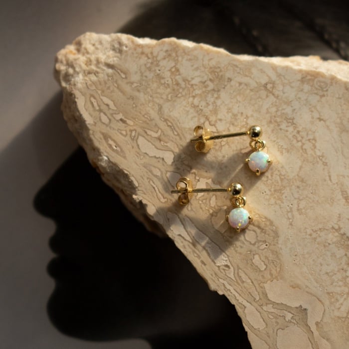 Minimal stud earrings with luminous opal drops