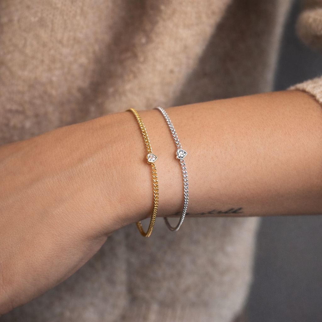 heart charm bracelets on wrist