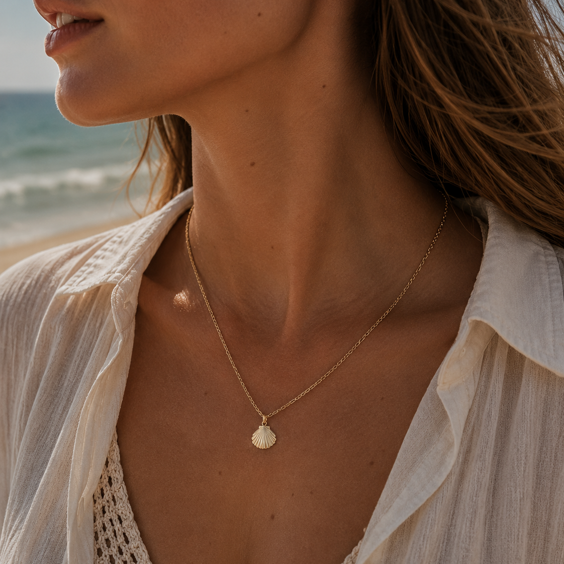 Woman wearing a delicate necklace with a scenic background
