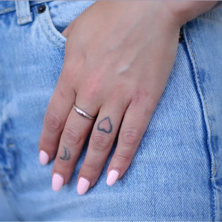 Silver Slim Dome Ring stacked on hand