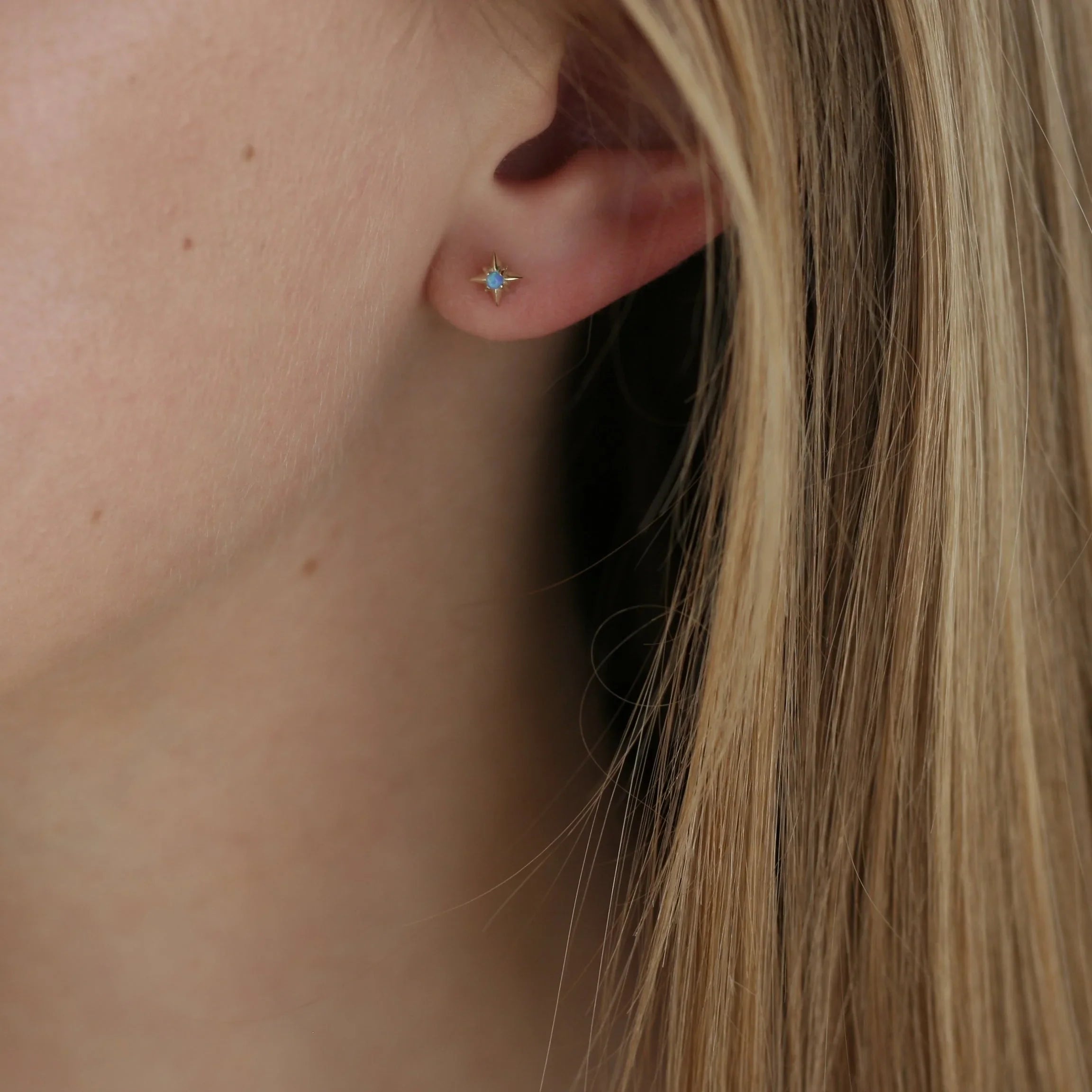 Stella opal stud earrings – on ear
