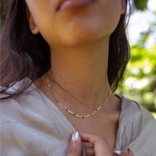 Timeless 10k gold Figaro chain with polished finish