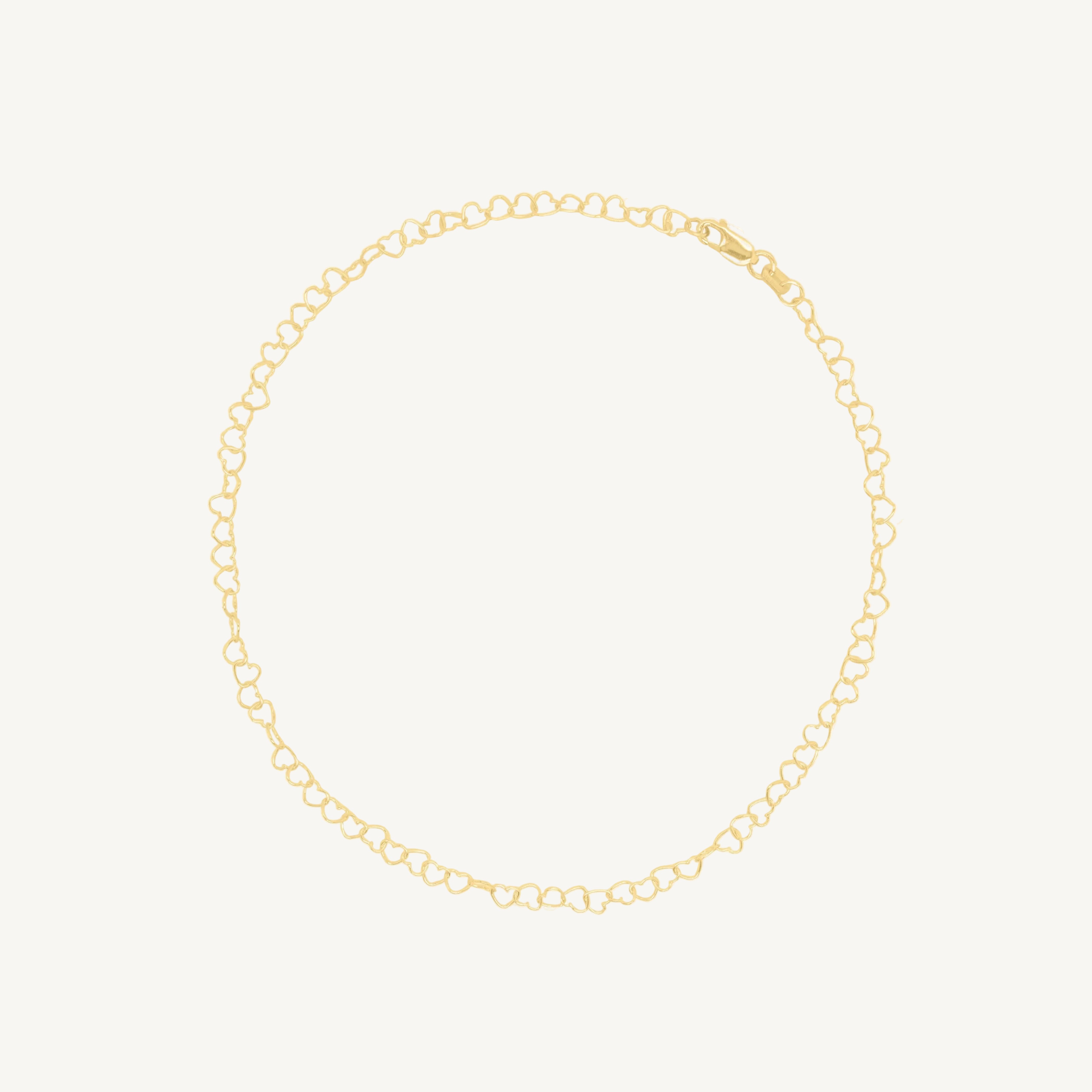 Delicate heart chain anklet in 10k gold