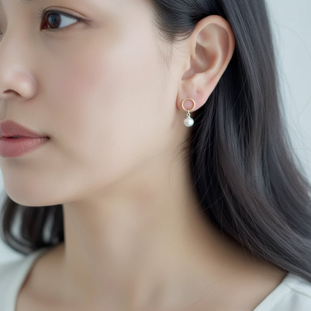 Elise pearl stud earrings – worn on ear