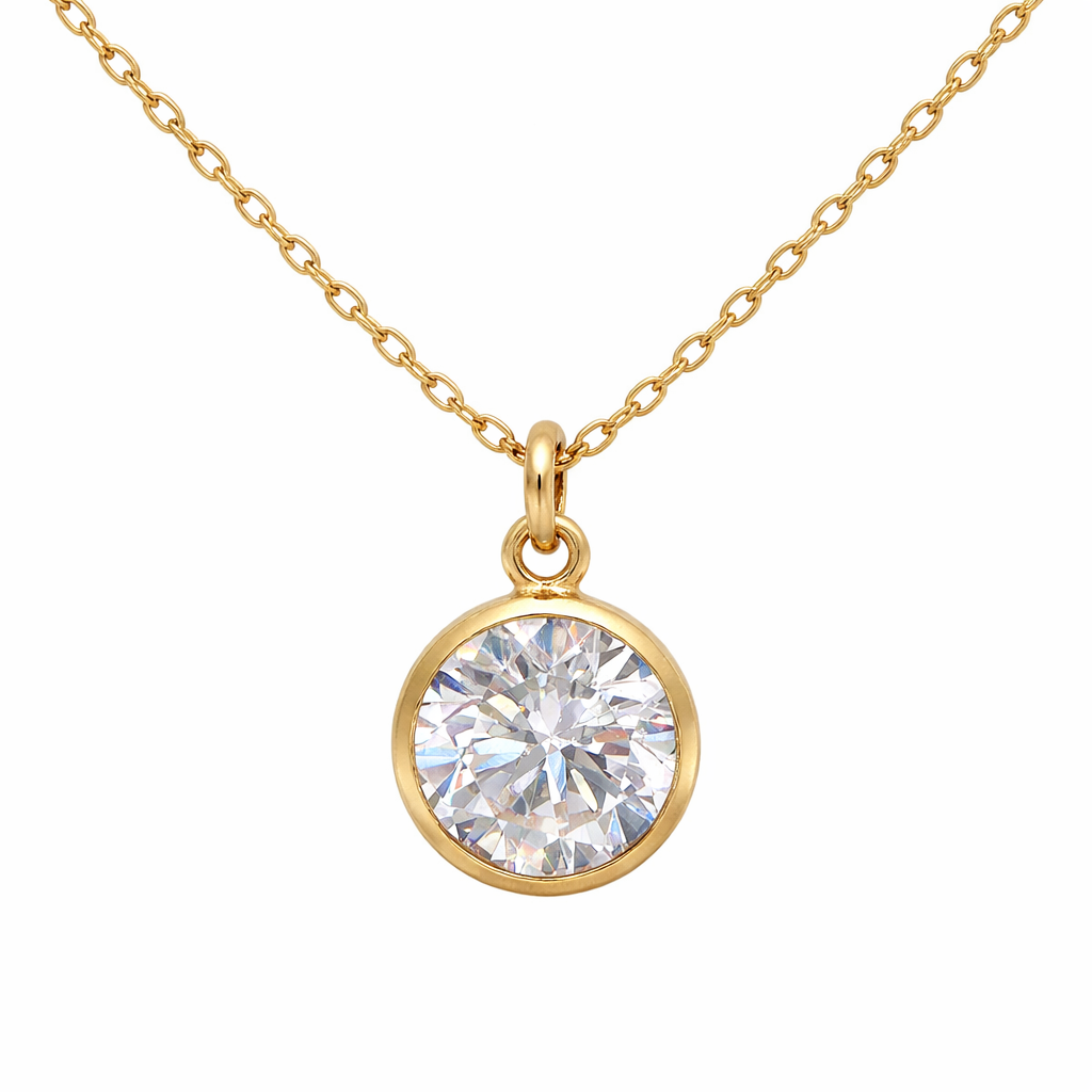 April birthstone necklace with a round faux diamond pendant on a white background