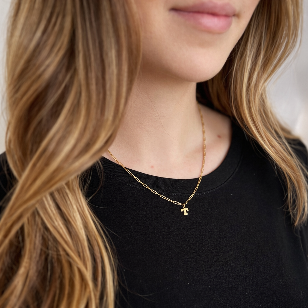 model wearing personalized gold-filled initial paperclip necklace