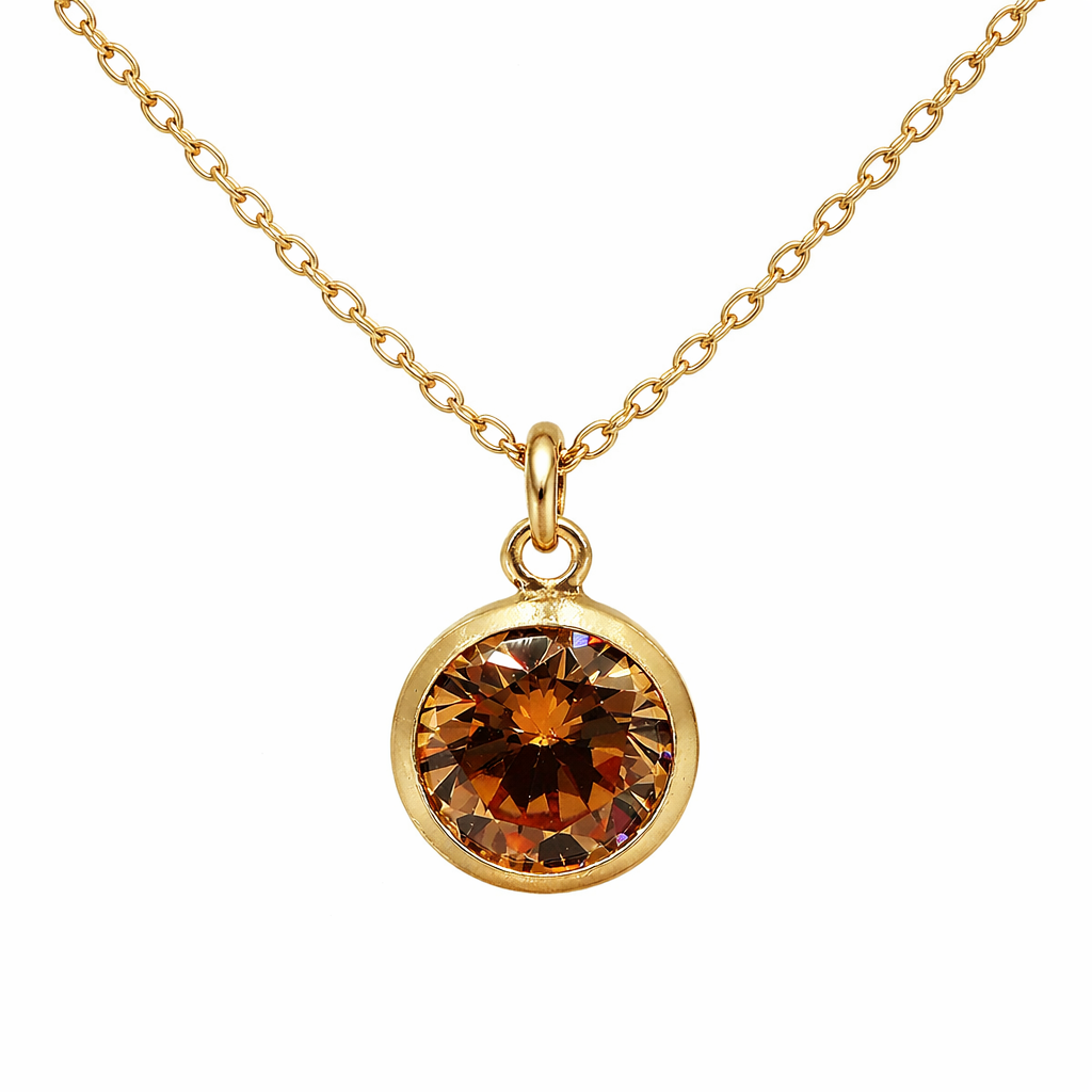 November birthstone necklace with a round amber-colored gemstone pendant on a white background