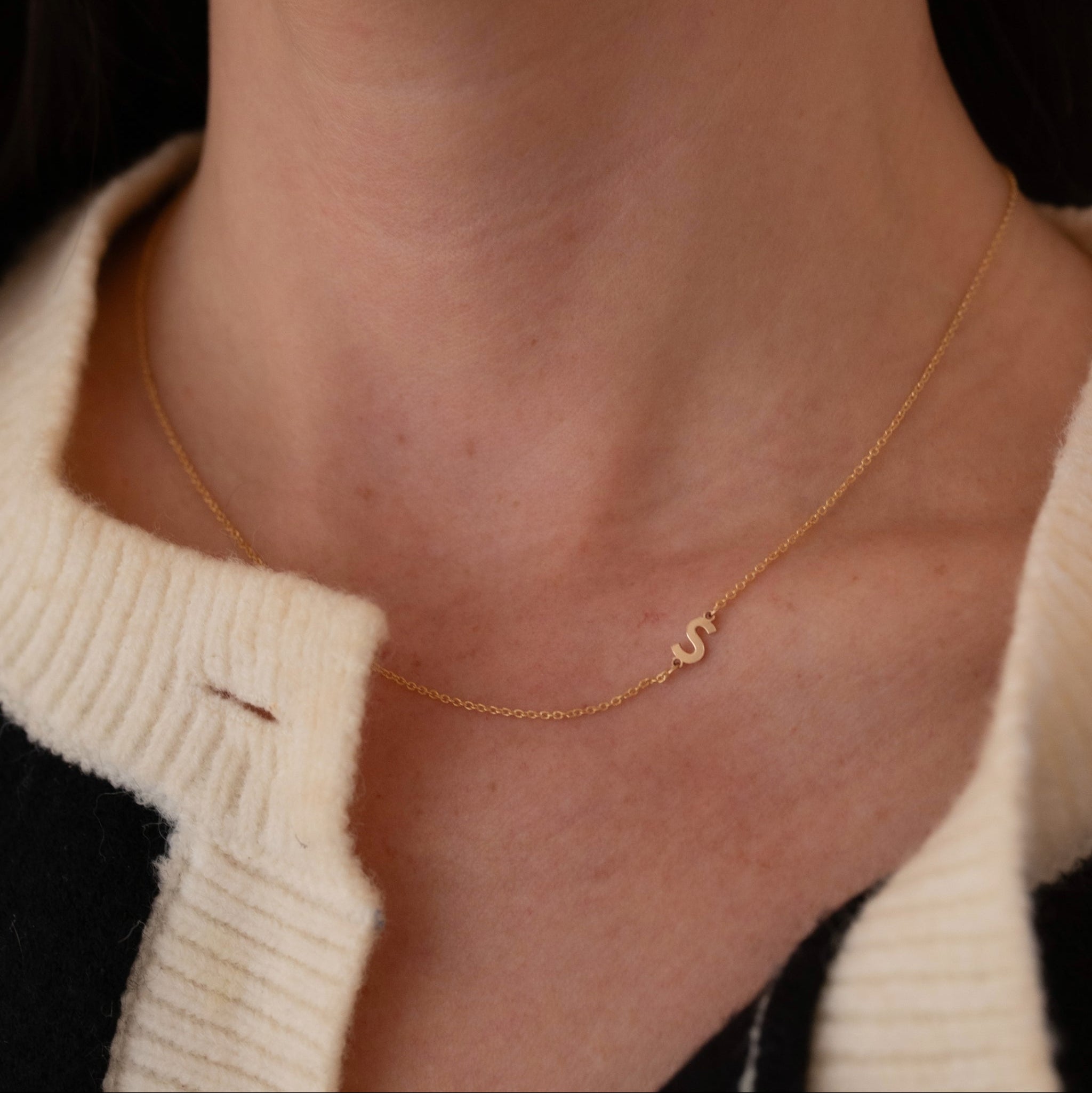 dainty personalized gold-filled initial necklace on model