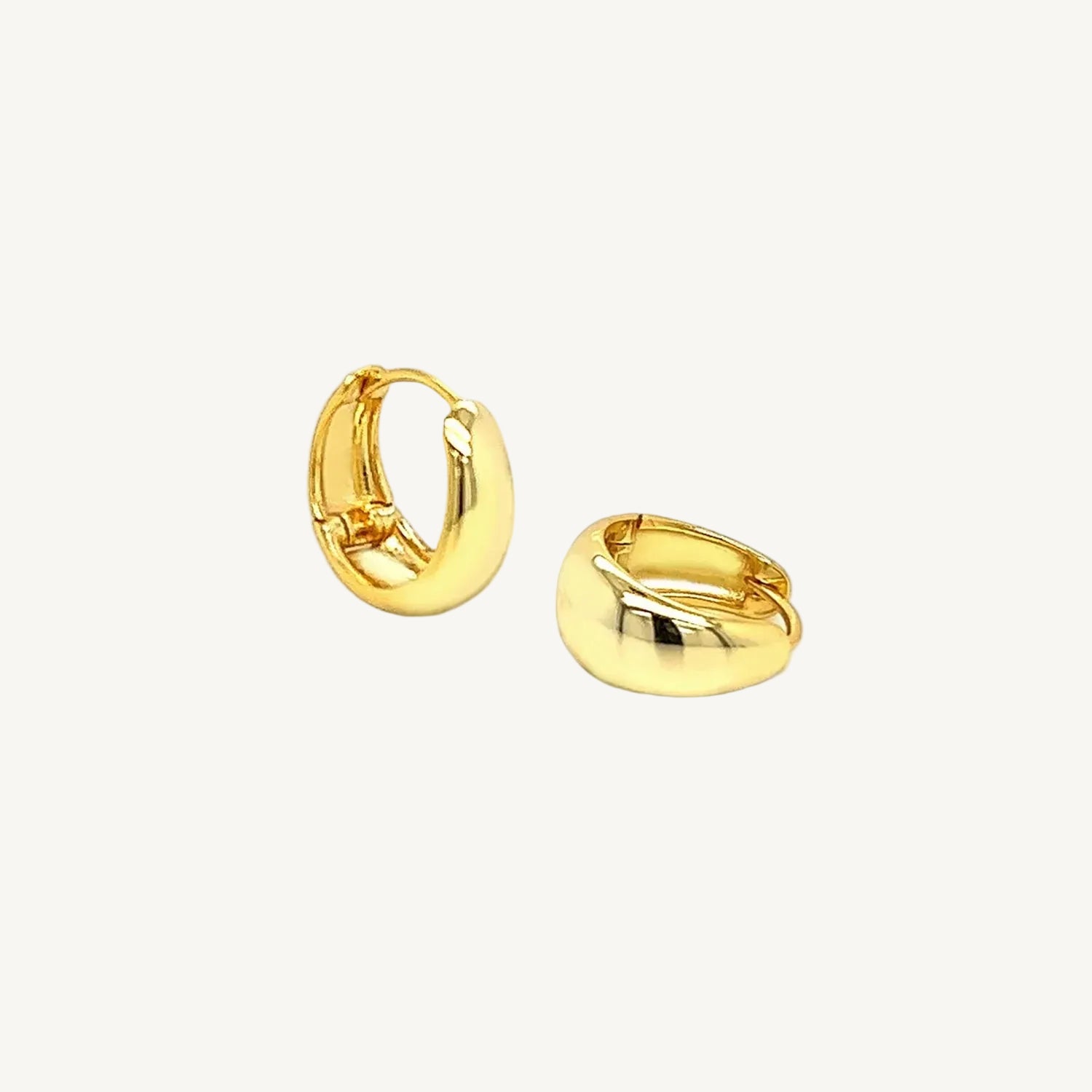 Large dome huggie earrings in gold vermeil