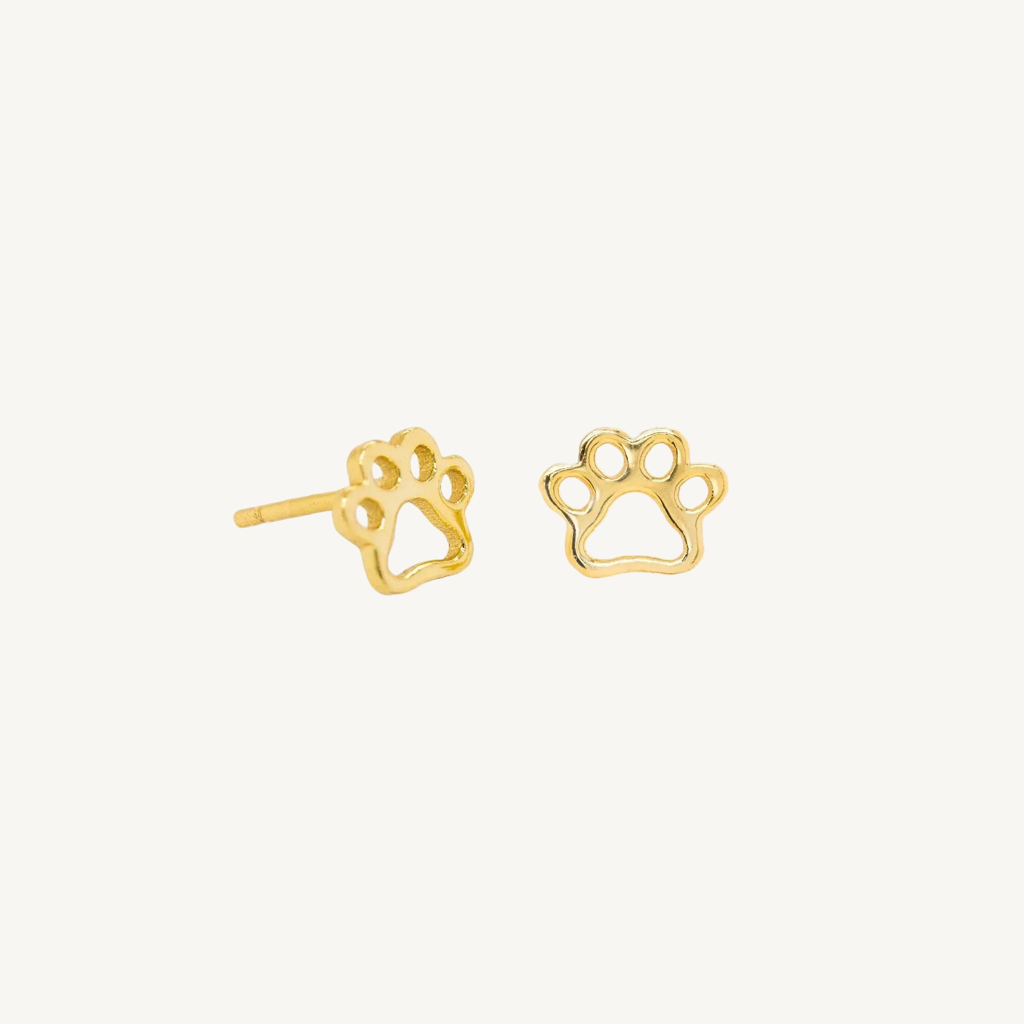 Delicate paw print studs in gold vermeil
