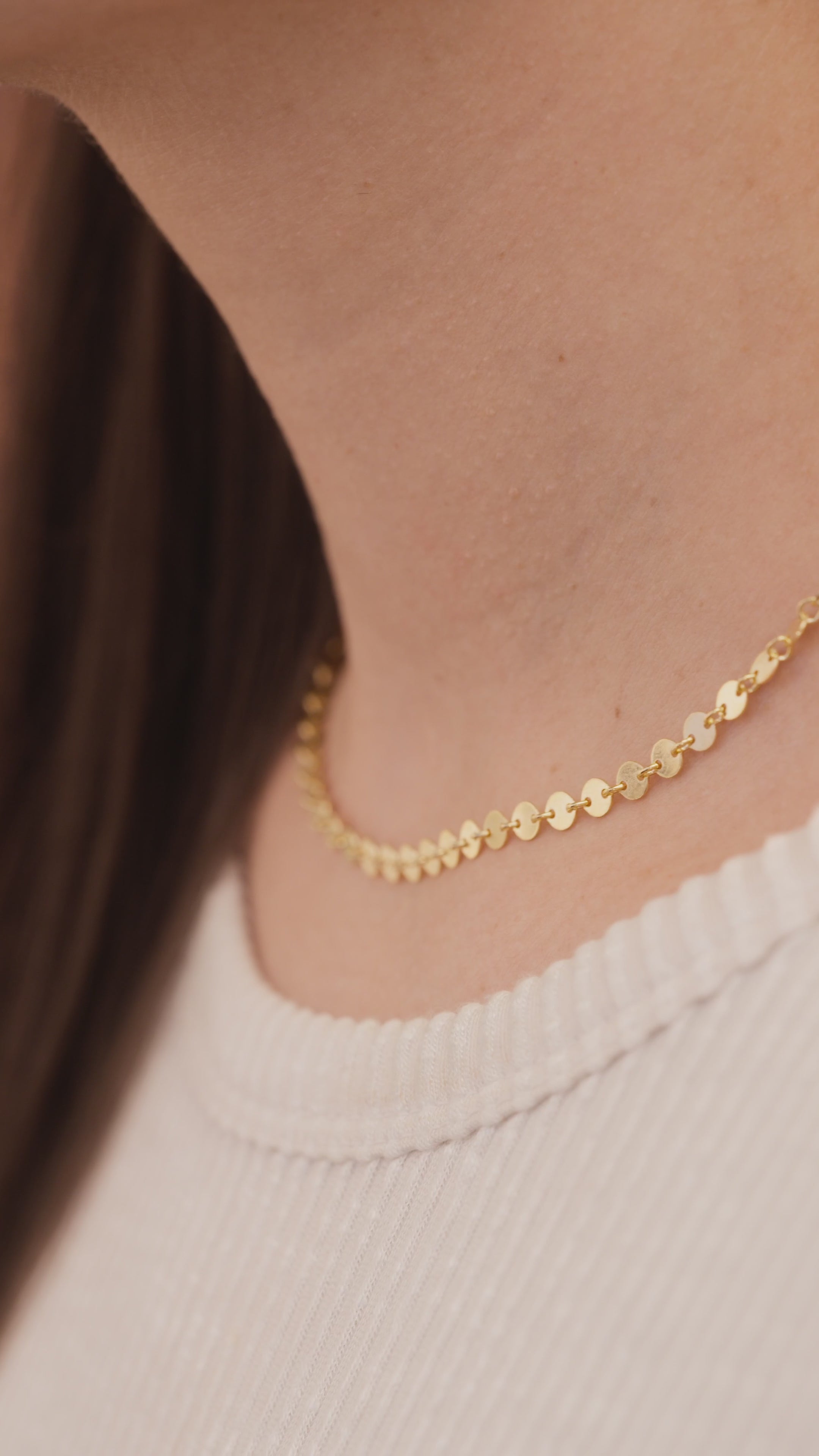closeup of gold-filled dis chain necklace