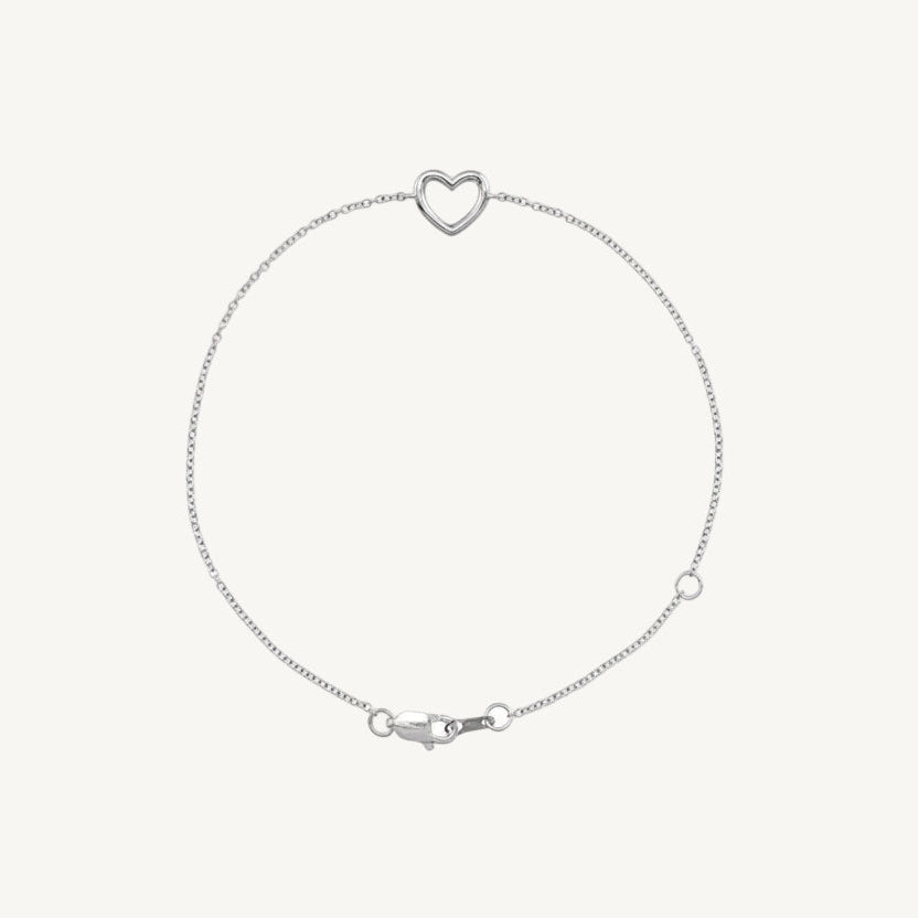 Sterling silver bracelet with puffed bubble heart charm